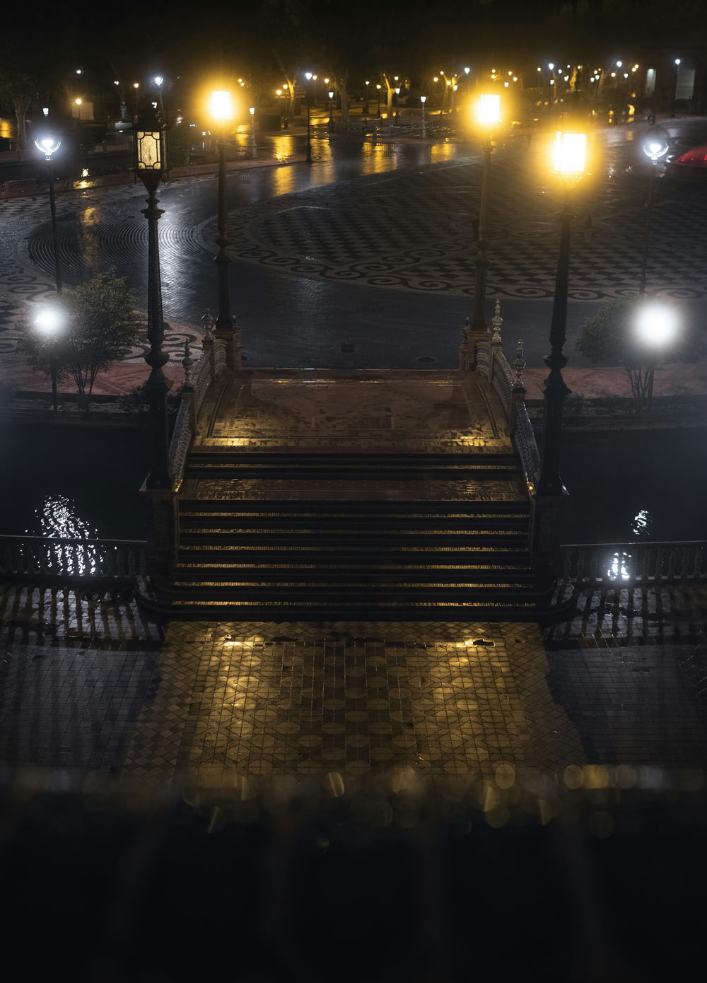 a set of steps with lights on at night