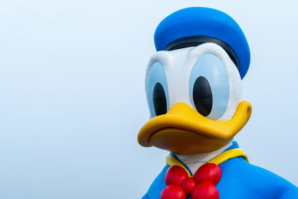 a close up of a donald duck balloon