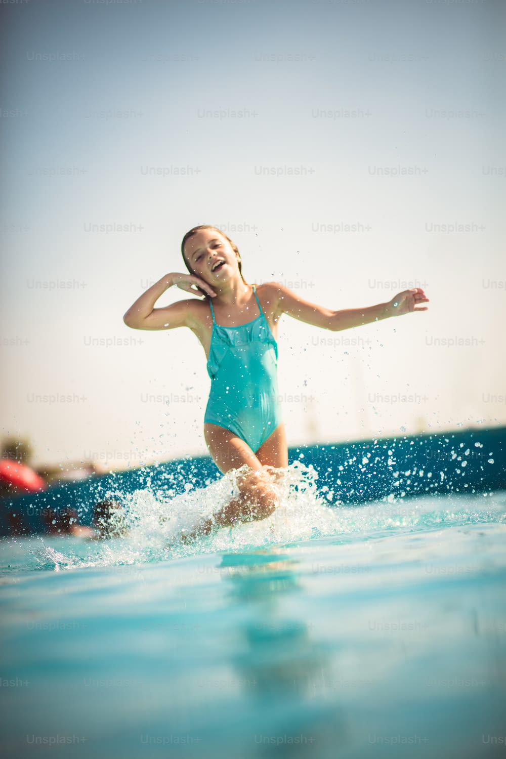 Summer adventure. Child in pool.