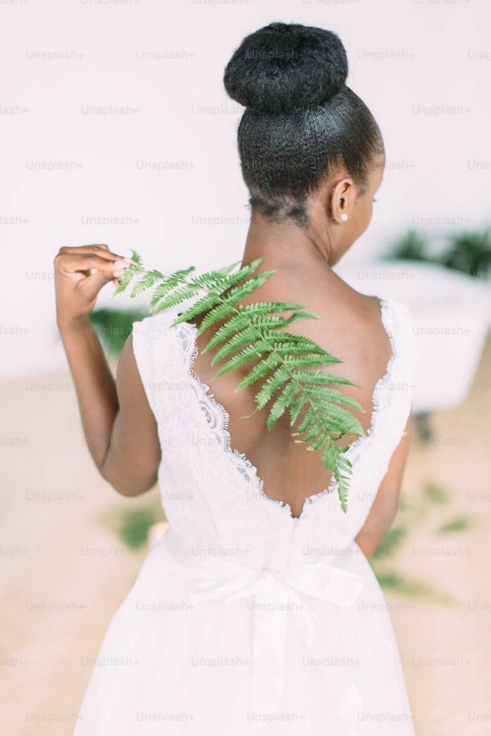 beautiful dark skin bride. Beautiful african american bride with fern.
