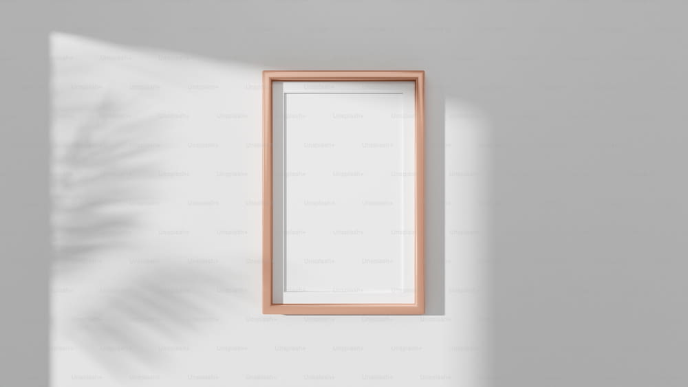Maquette d’affiche avec cadre vertical en or rose sur le mur de la chambre. Rendu 3D.