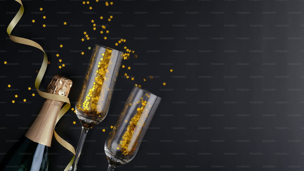 Champagne bottle, glasses, golden confetti on black background. Christmas or birthday celebration concept. Flat lay, top view, copy space.