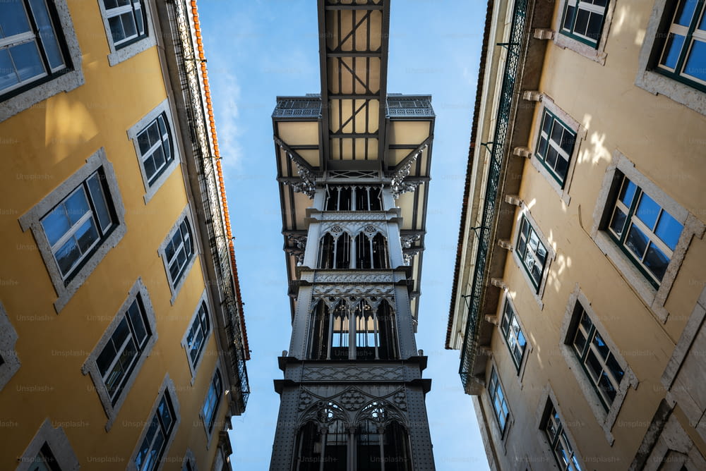 Elevador de Sant Justa (Santa Justa Lift) as seen from a narrow street in Baixa, Lisbon.