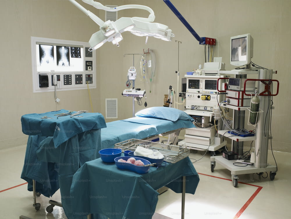 a hospital room with medical equipment and medical equipment