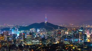 Downtown cityscape at night in Seoul, South Korea.