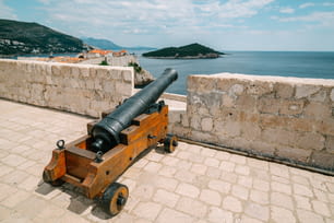 Cannon at wall of Dubrovnik Old Town, in Dalmatia, Croatia, the prominent travel destination of Croatia. Dubrovnik old town was listed as UNESCO World Heritage Sites in 1979.