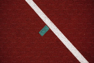 a tennis court with a blue and white line on it