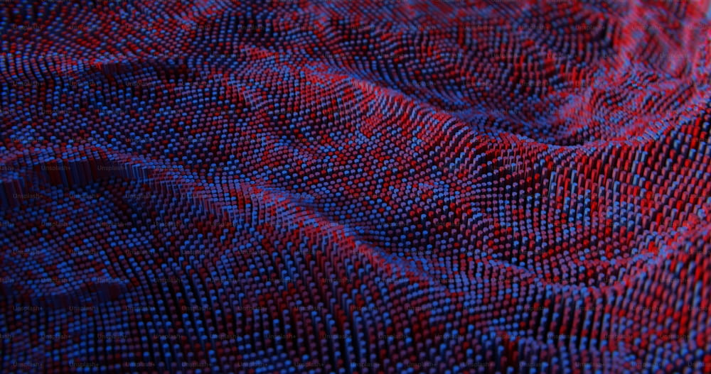 Un primer plano de una tela roja y azul