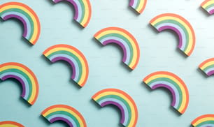 a group of rainbow shapes on a blue background