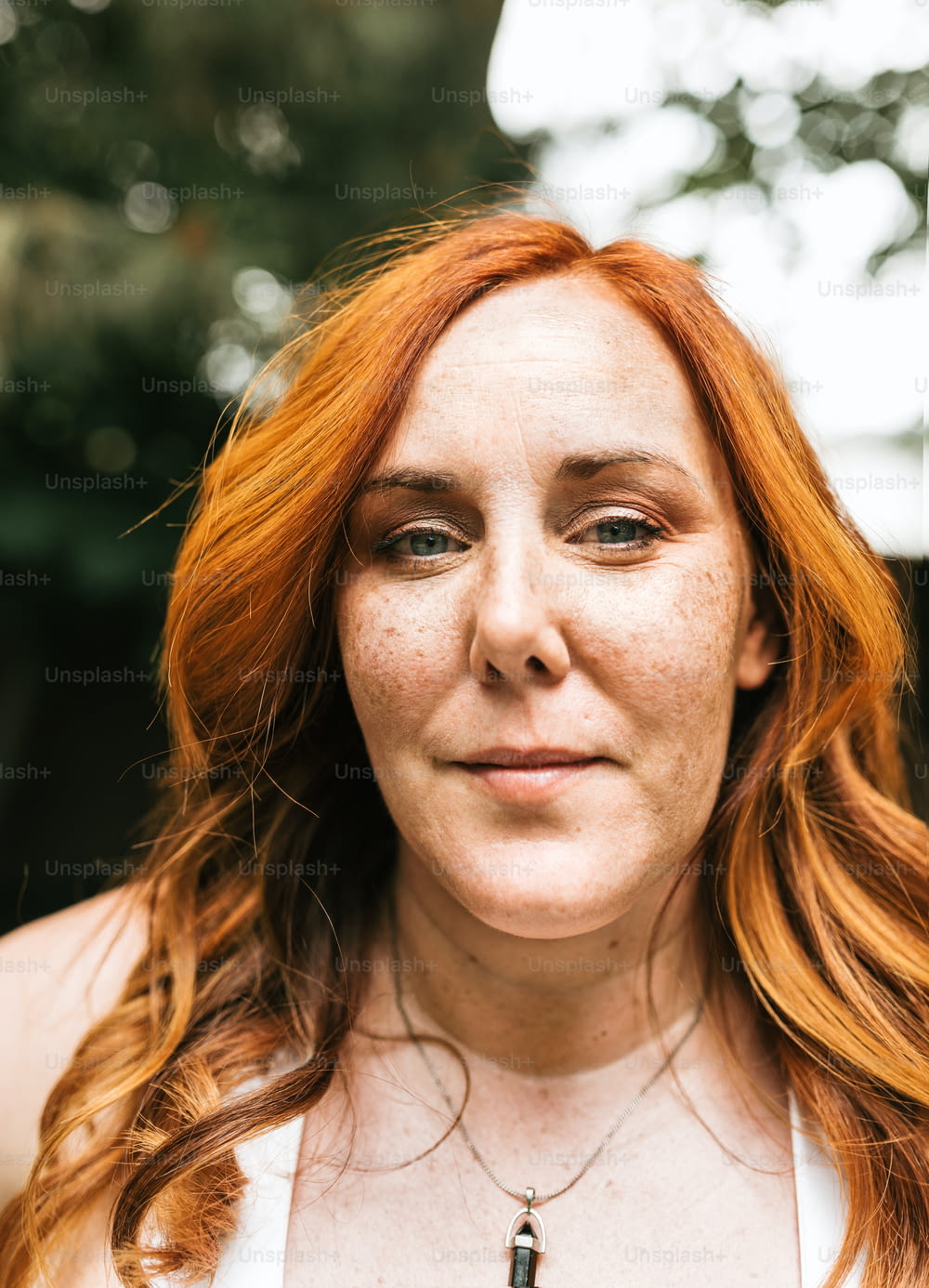 a close up of a person with red hair