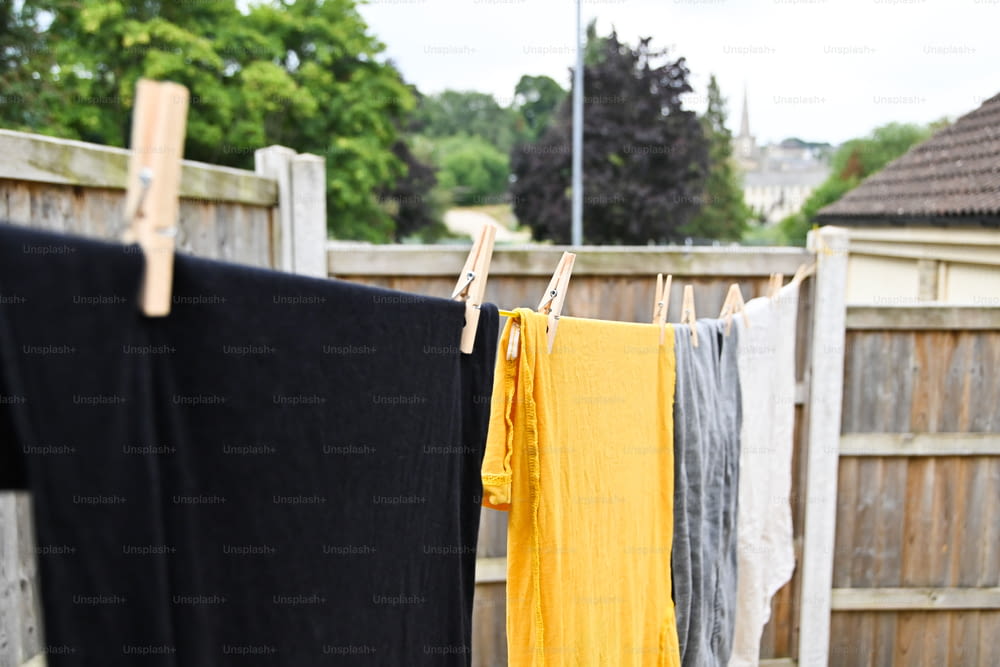 a line of clothes hanging on a clothes line