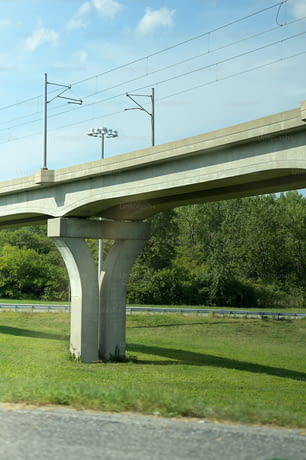 a highway overpass with power lines above it