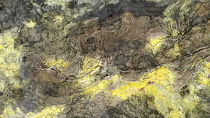 a painting of a mountain with yellow and black colors