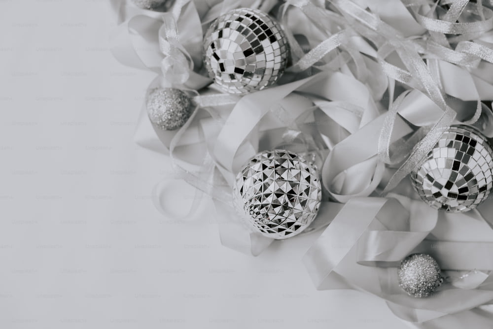 a black and white photo of christmas ornaments