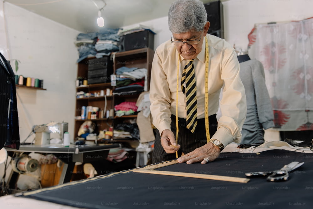 experienced mexican tailor working on local business