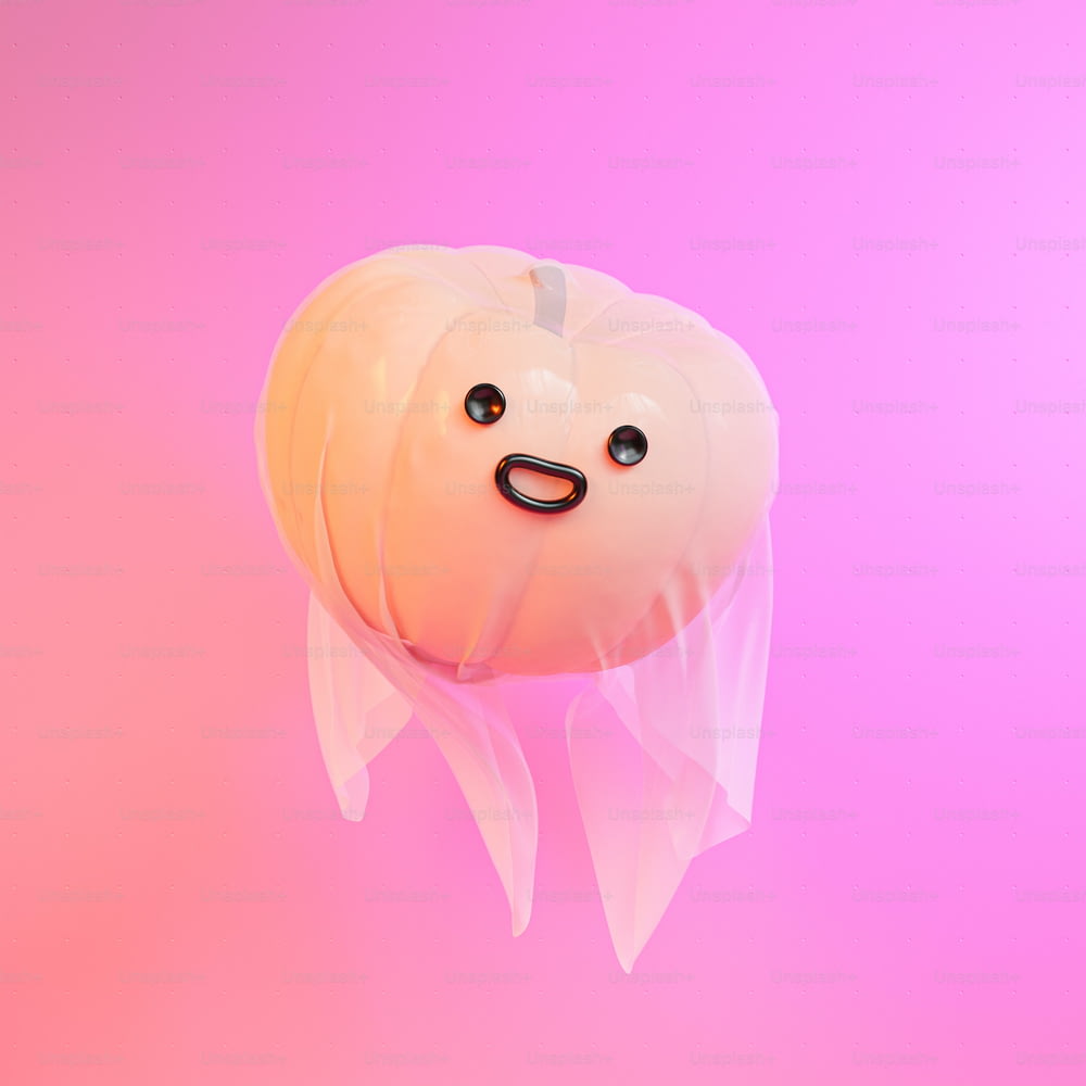 a plastic jelly with a funny face on a pink background