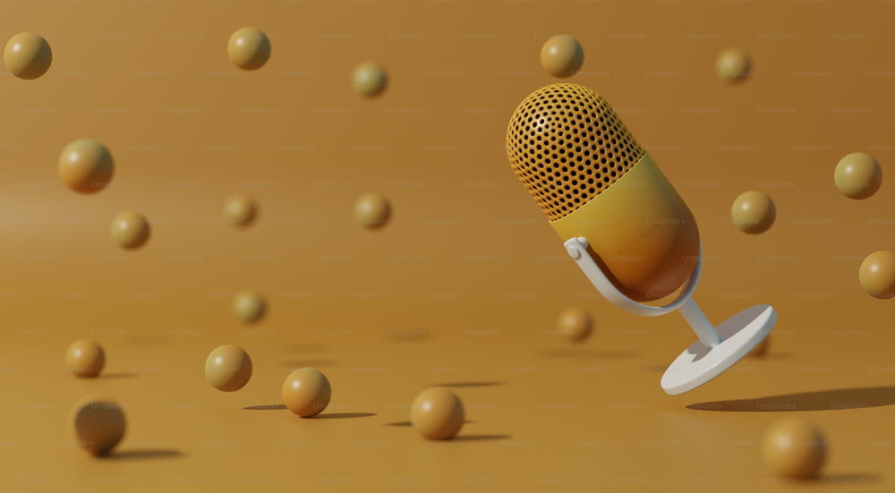 Un microfono giallo è circondato da piccole palline