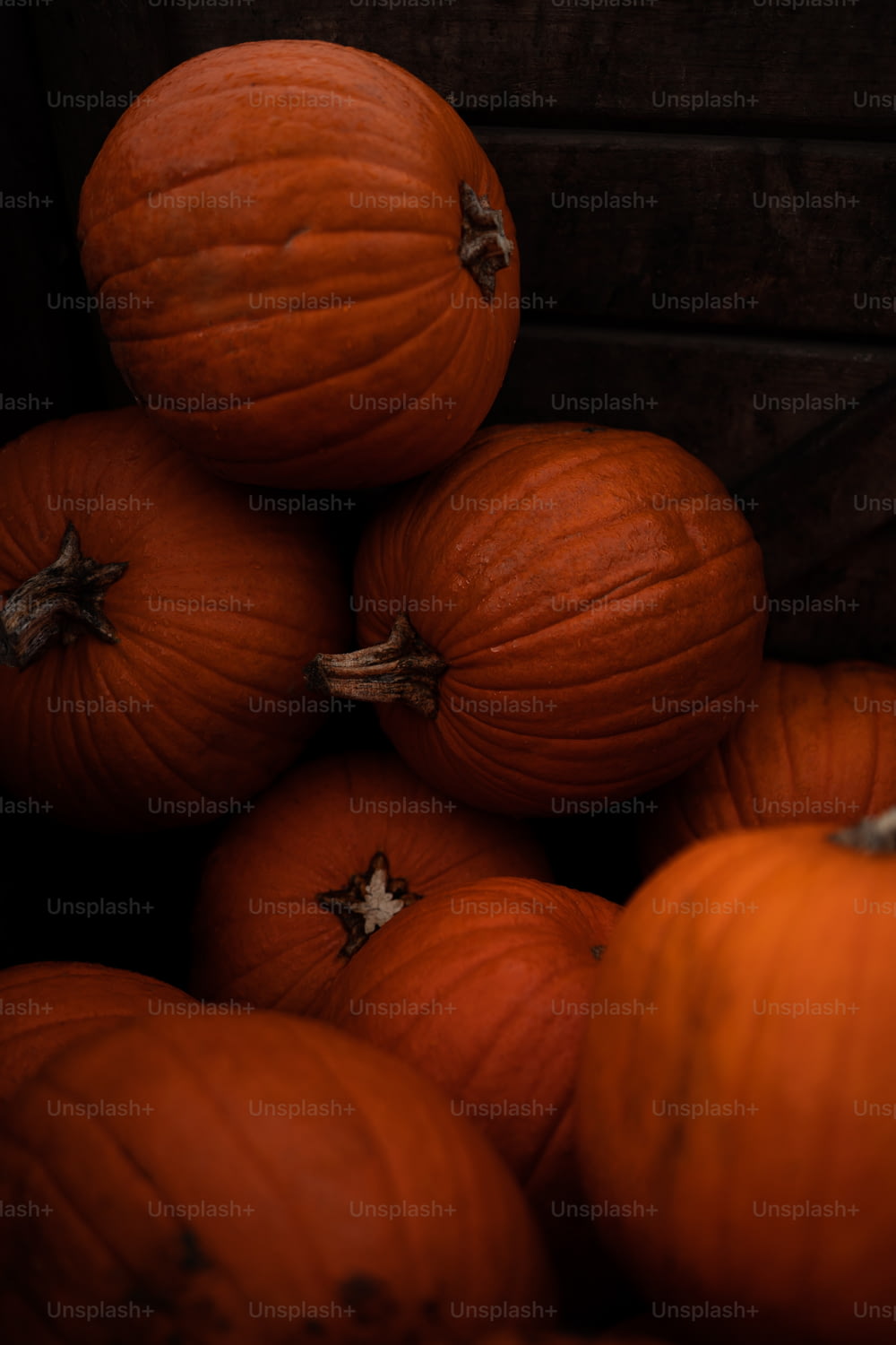 a pile of pumpkins sitting on top of each other