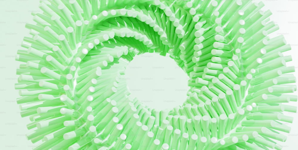 a circular object made out of toothbrushes on a white surface