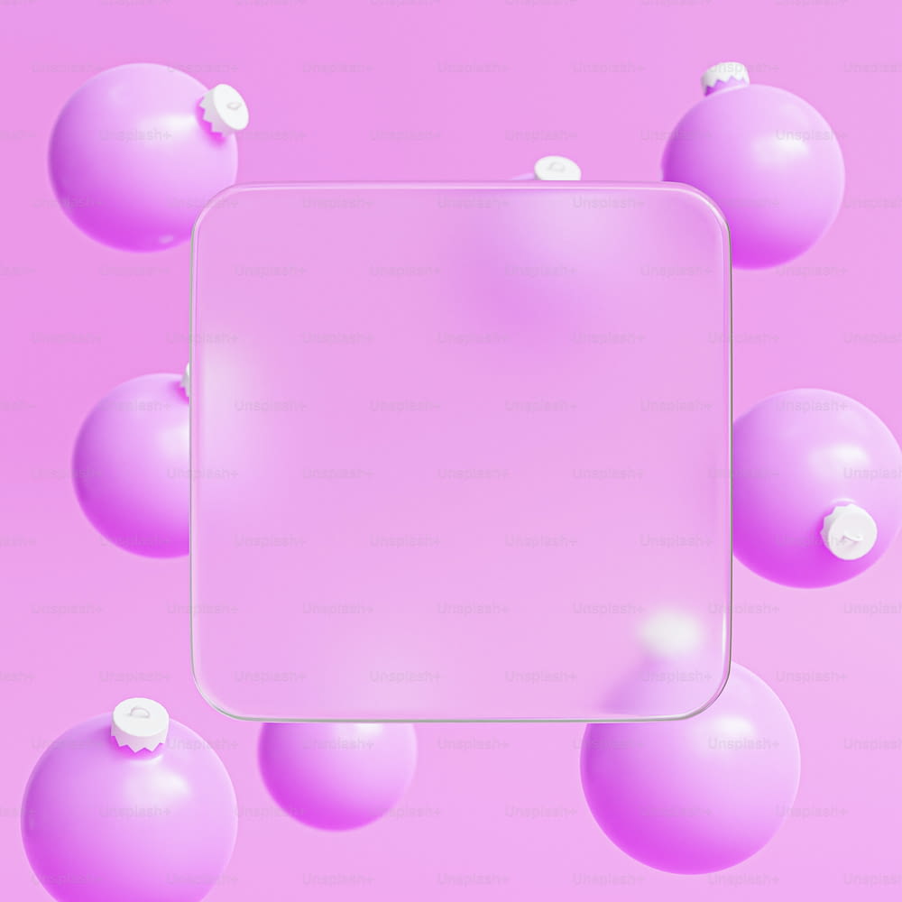a white square frame surrounded by pink balls
