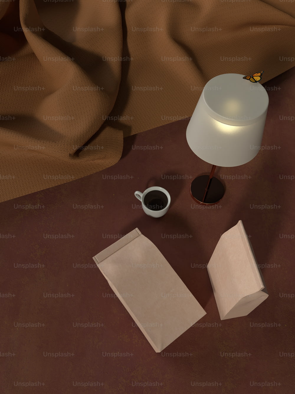 a table with a lamp, paper and a cup of coffee