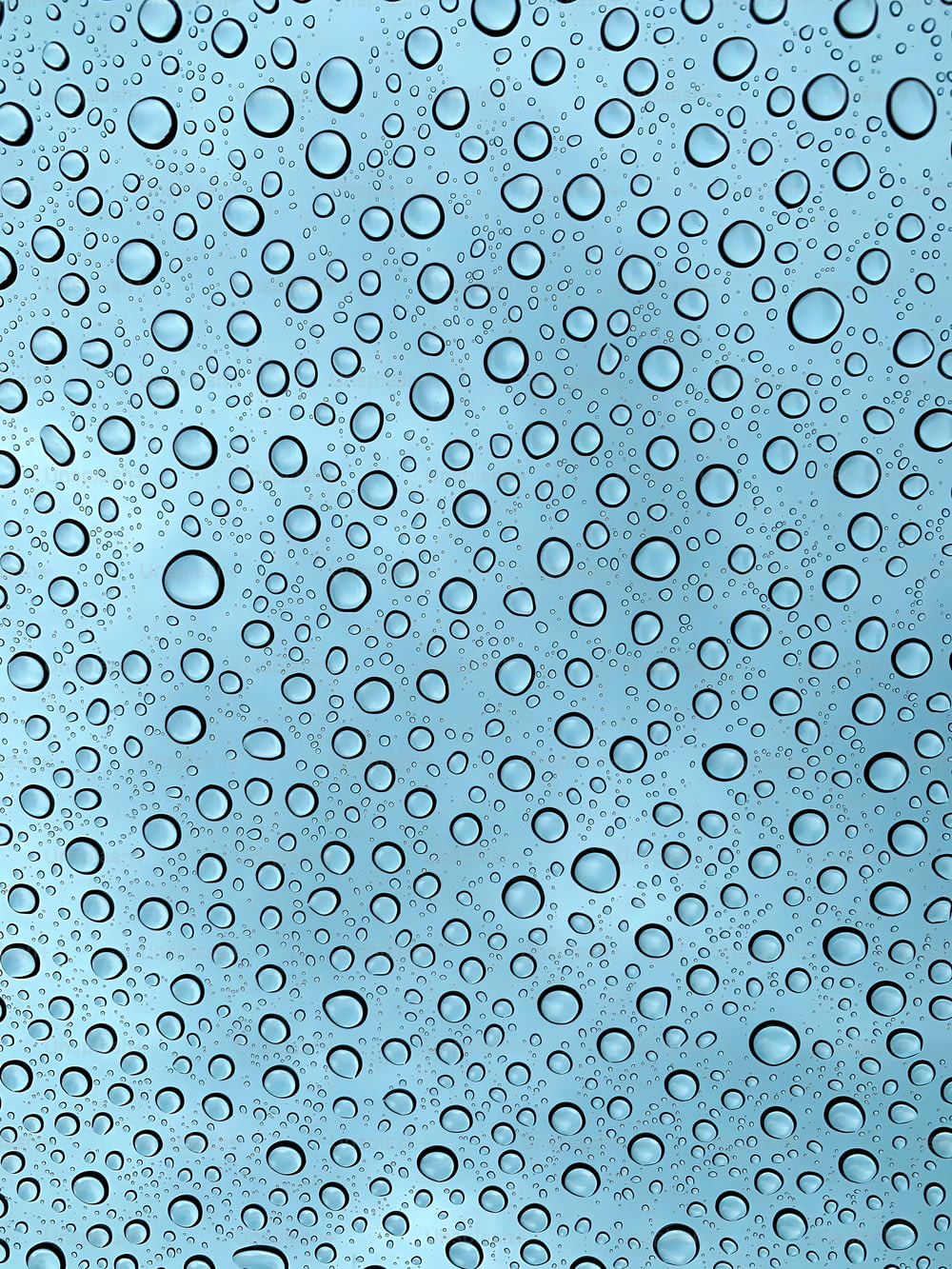 a close up of water droplets on a window