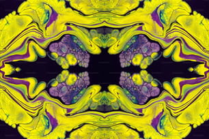 an abstract image of a yellow and purple flower