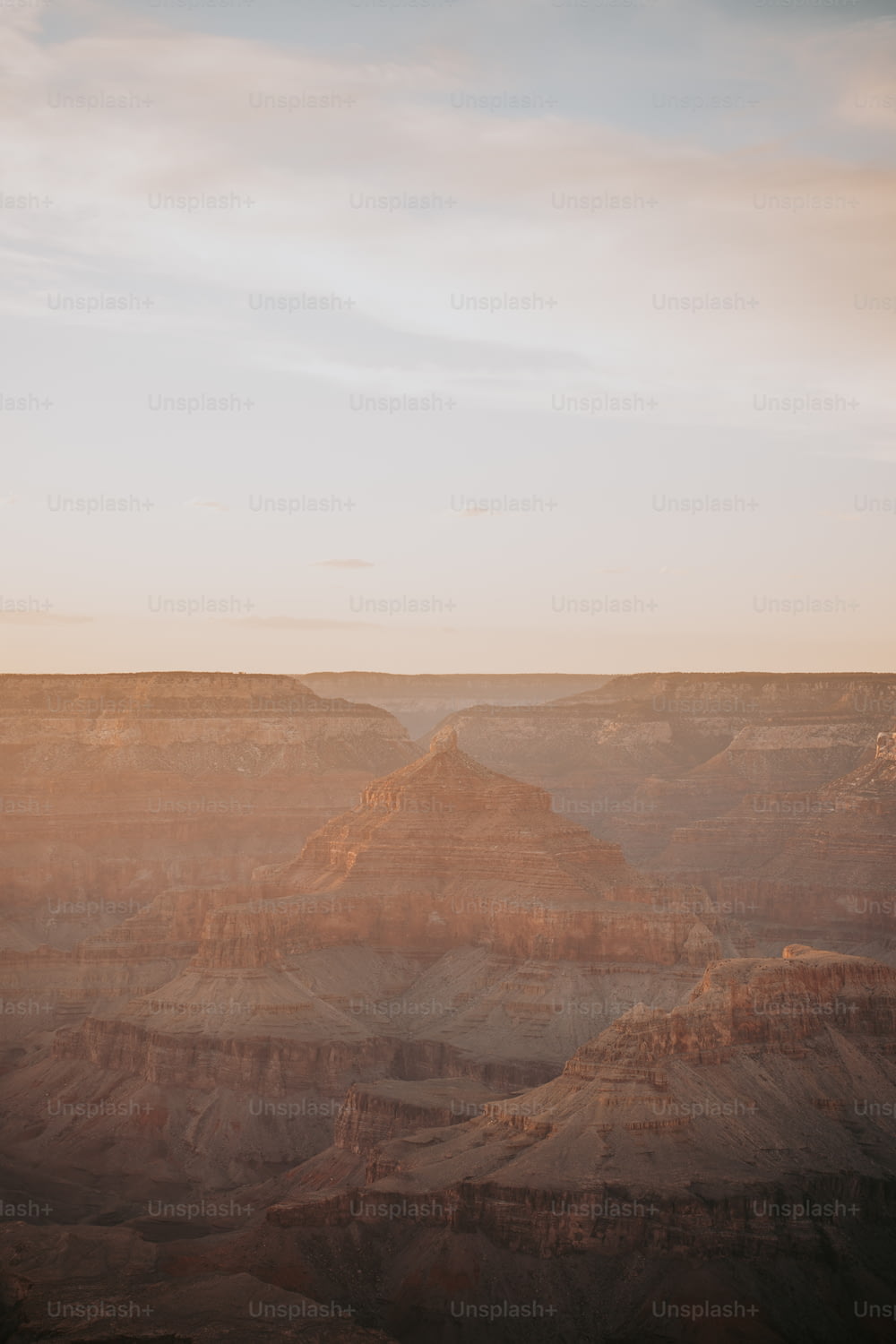 a scenic view of the grand canyon at sunset