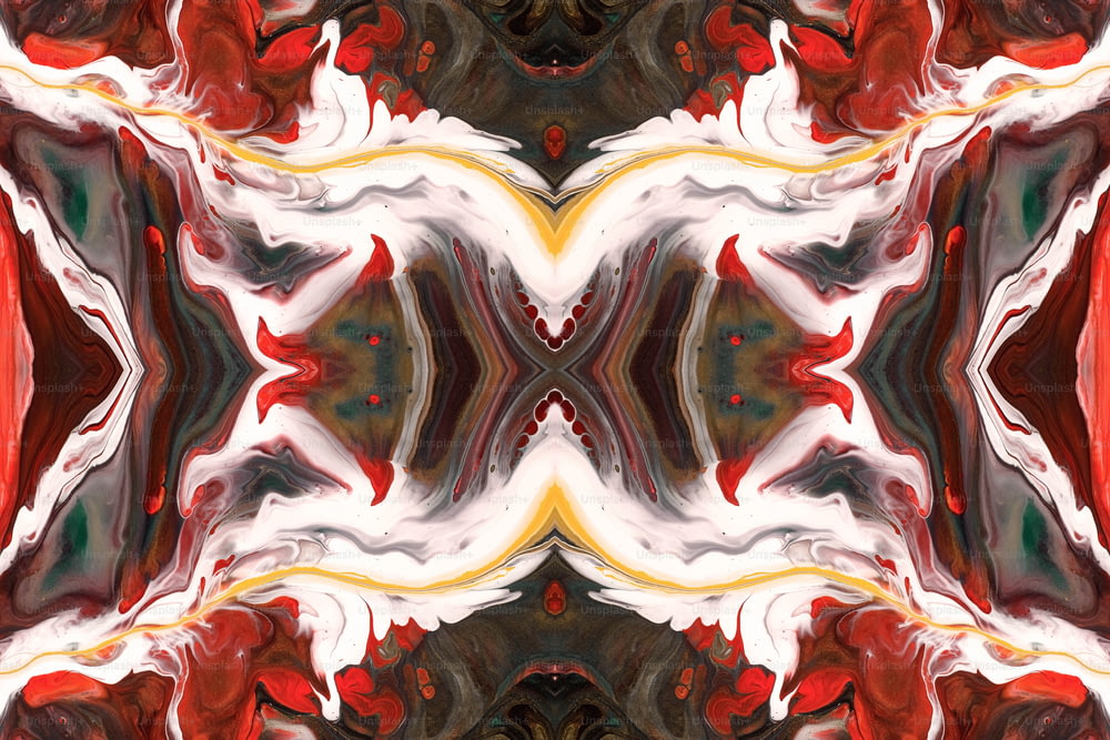 an abstract image of a red, white, and yellow flower
