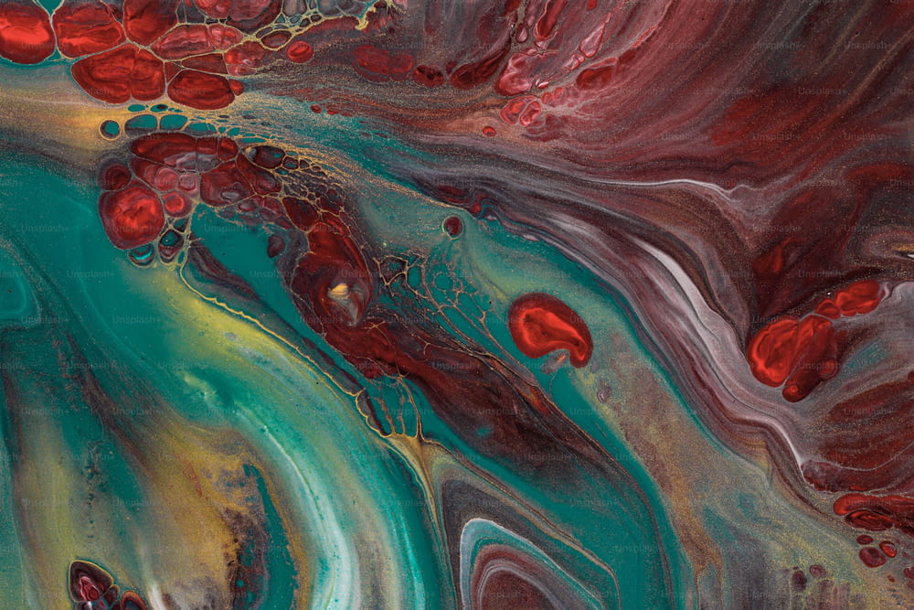 an abstract painting with red and green colors