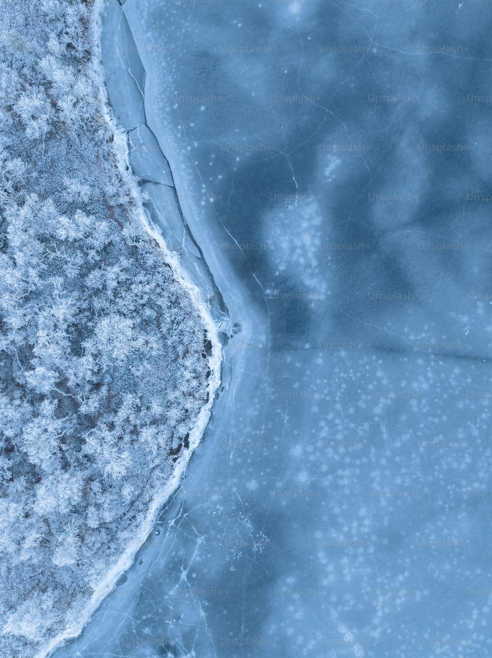 an aerial view of the ice and water
