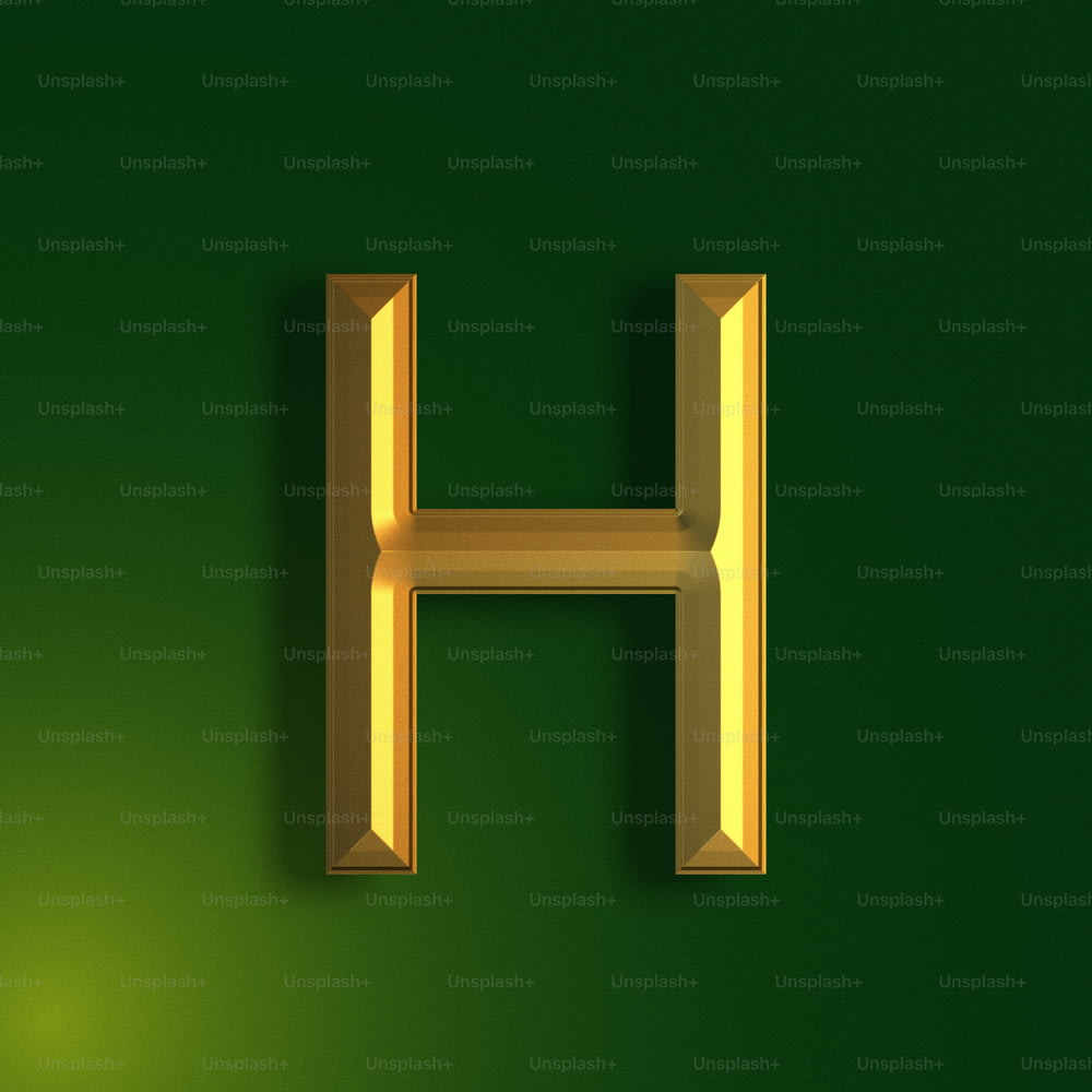a golden h on a green background