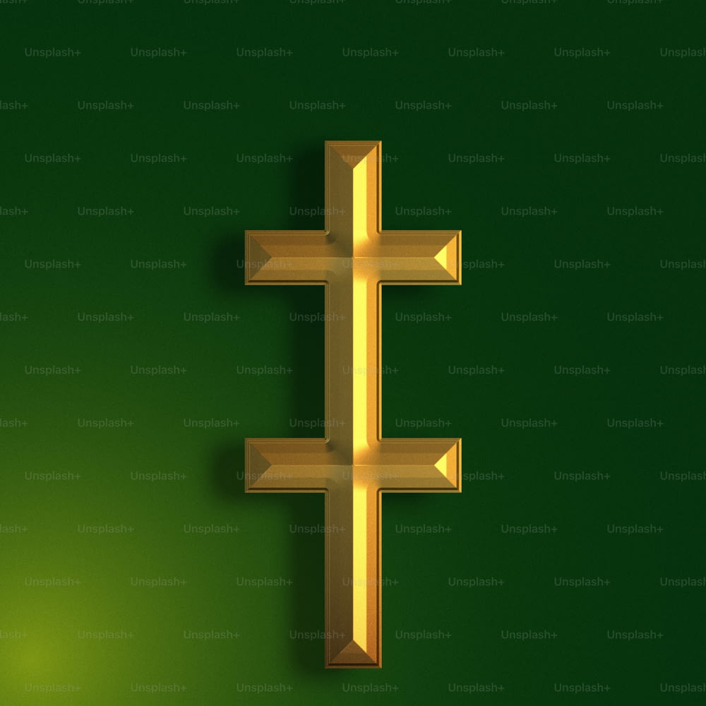 Una cruz de oro sobre un fondo verde