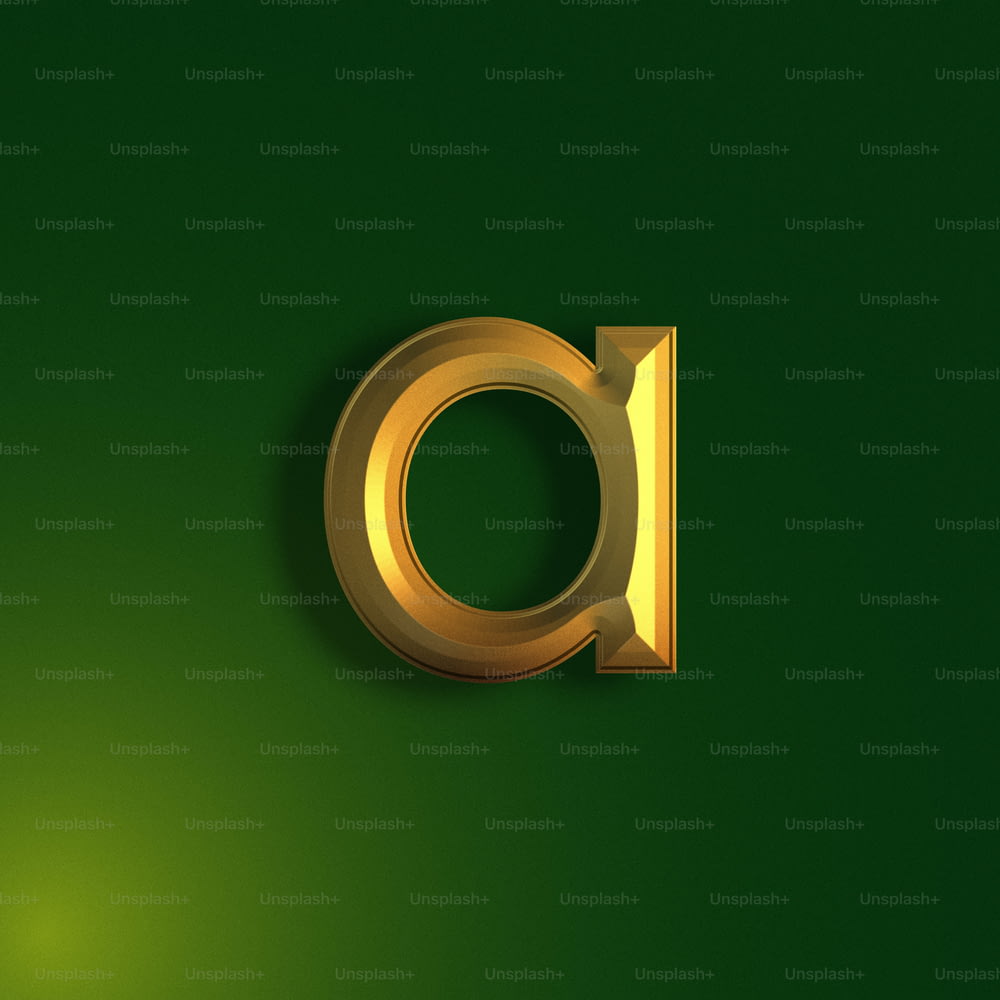 a golden letter on a green background
