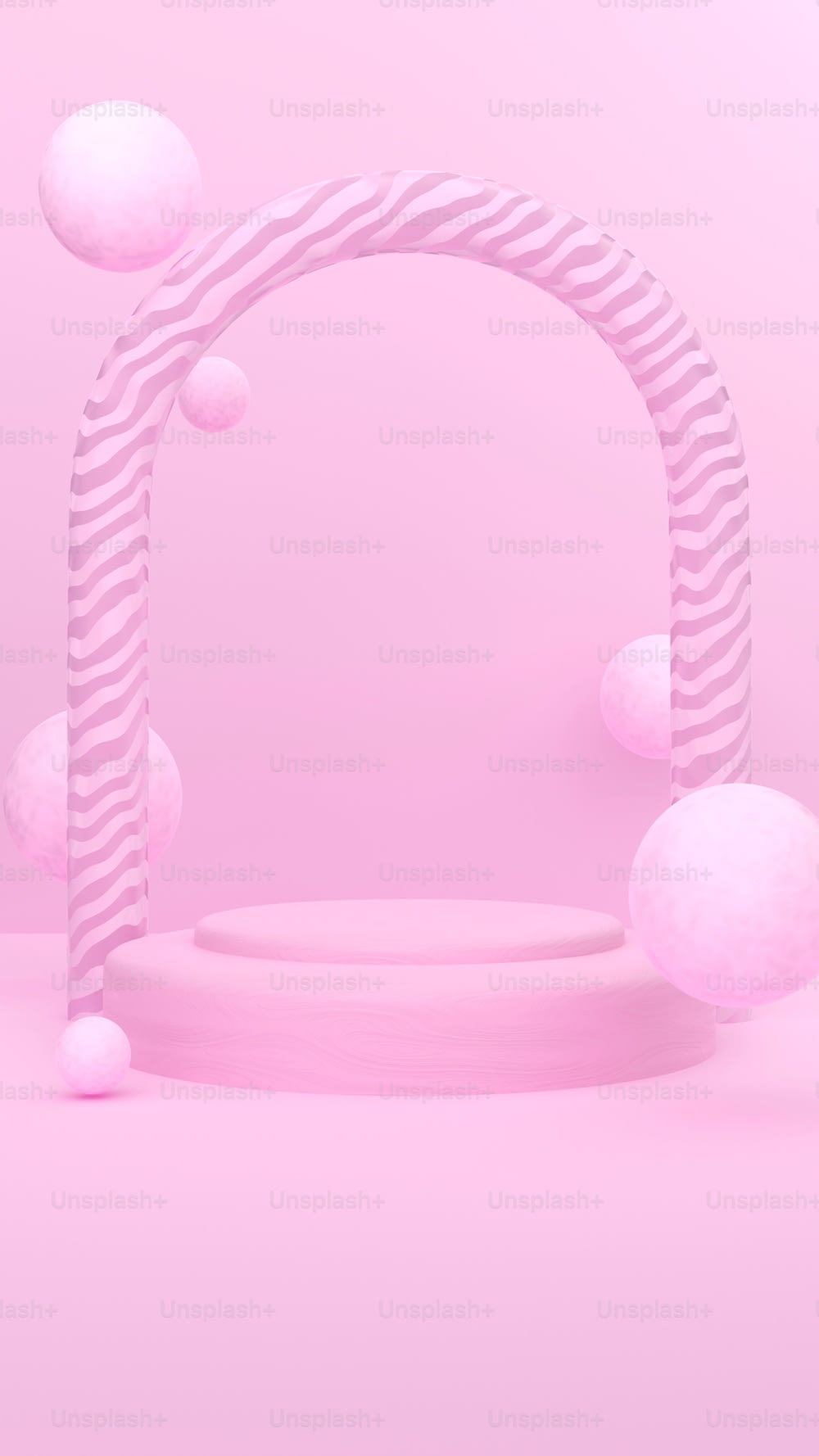 a pink background with a circular object in the middle