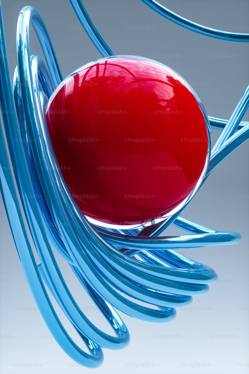 um objeto vermelho sentado em cima de um objeto azul