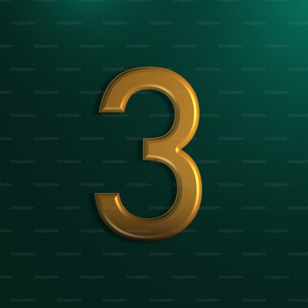 a gold number three on a green background
