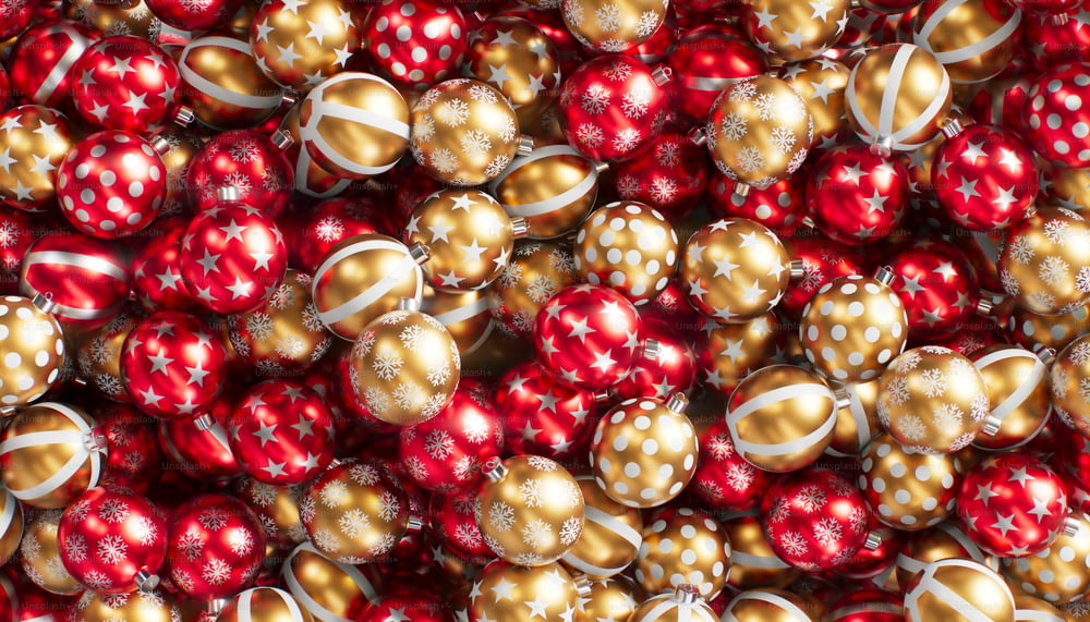 a pile of red and gold christmas ornaments