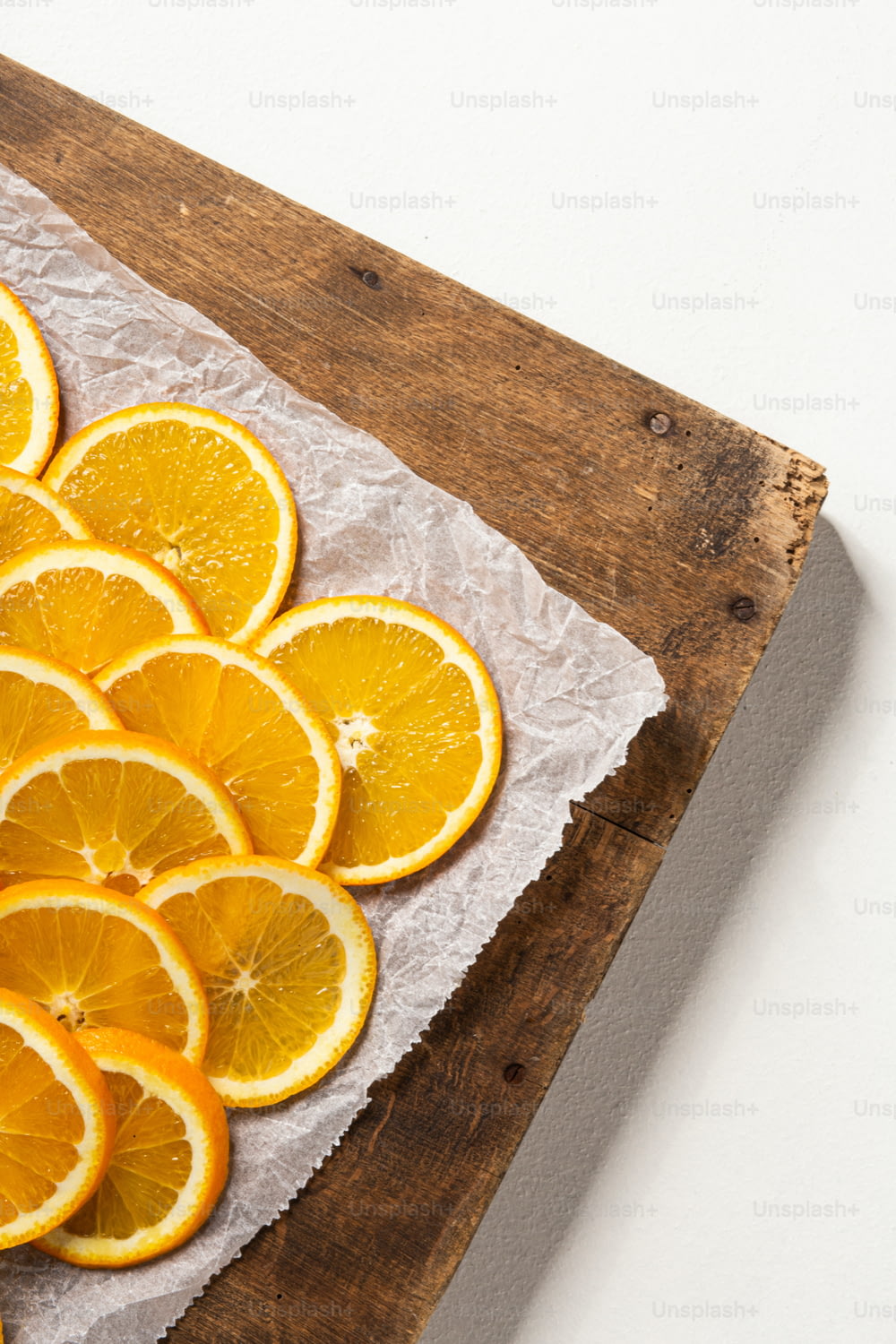 a sliced orange on a cutting board