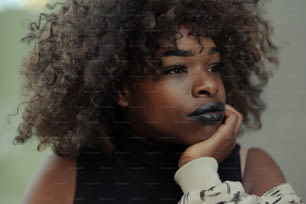a close up of a person with a black lipstick