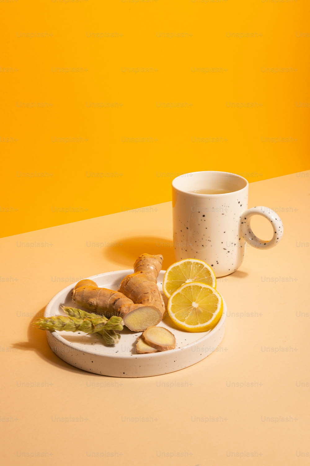 a plate of food and a cup on a table