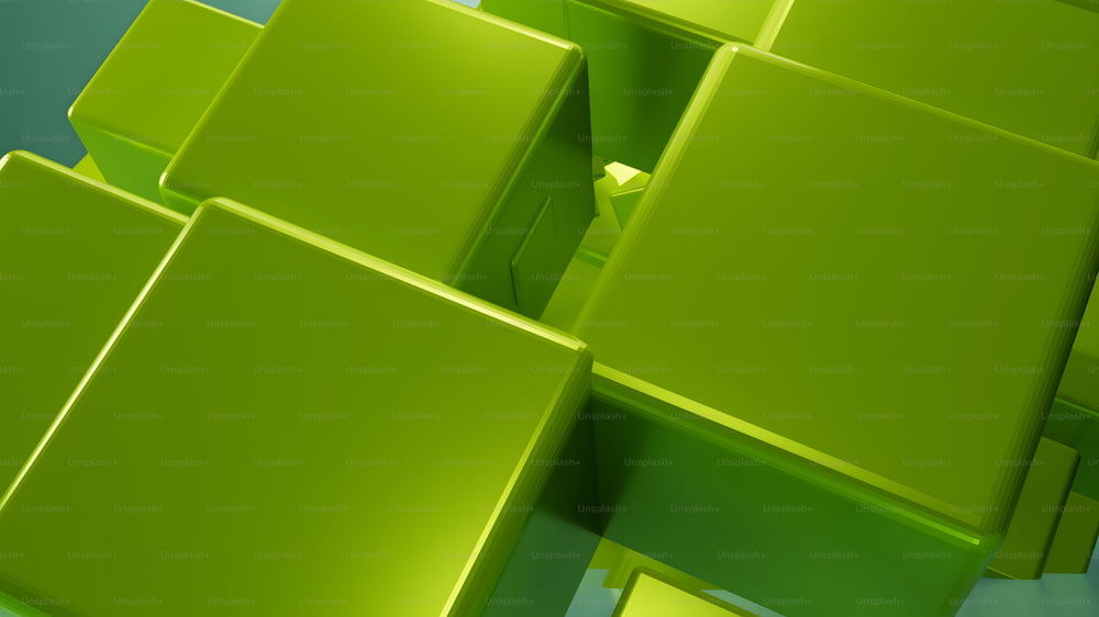 um grupo de cubos verdes sentados uns em cima dos outros
