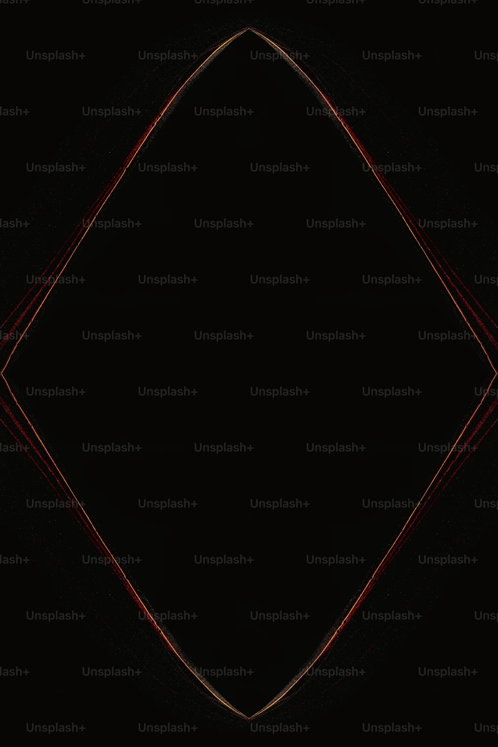 a black background with a red diamond in the center