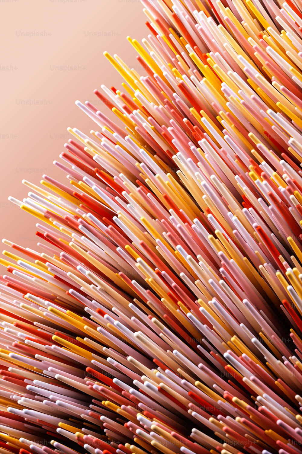a large pile of colorful toothbrushes sitting on top of a table