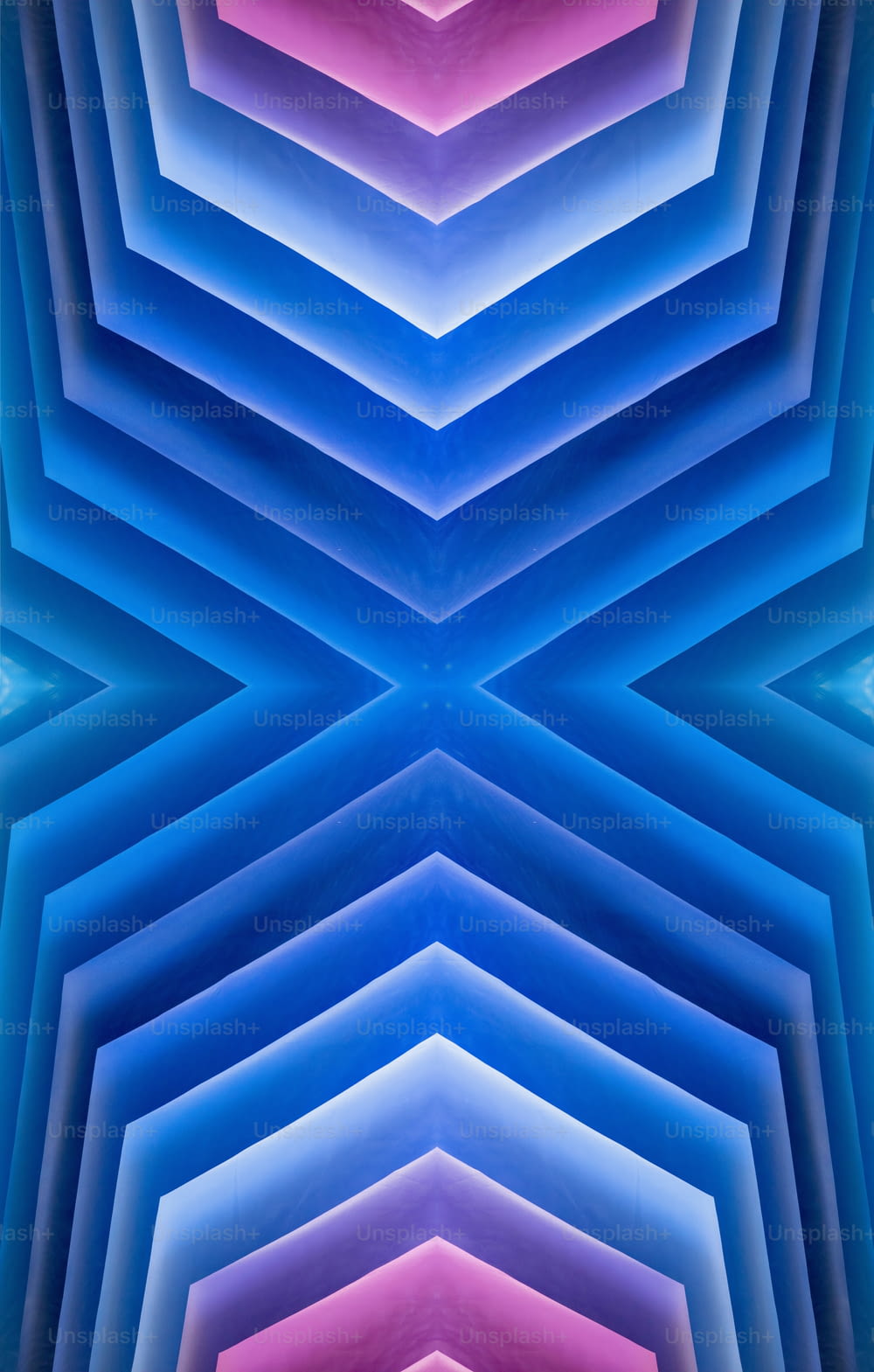 an abstract image of blue, pink, and purple shapes