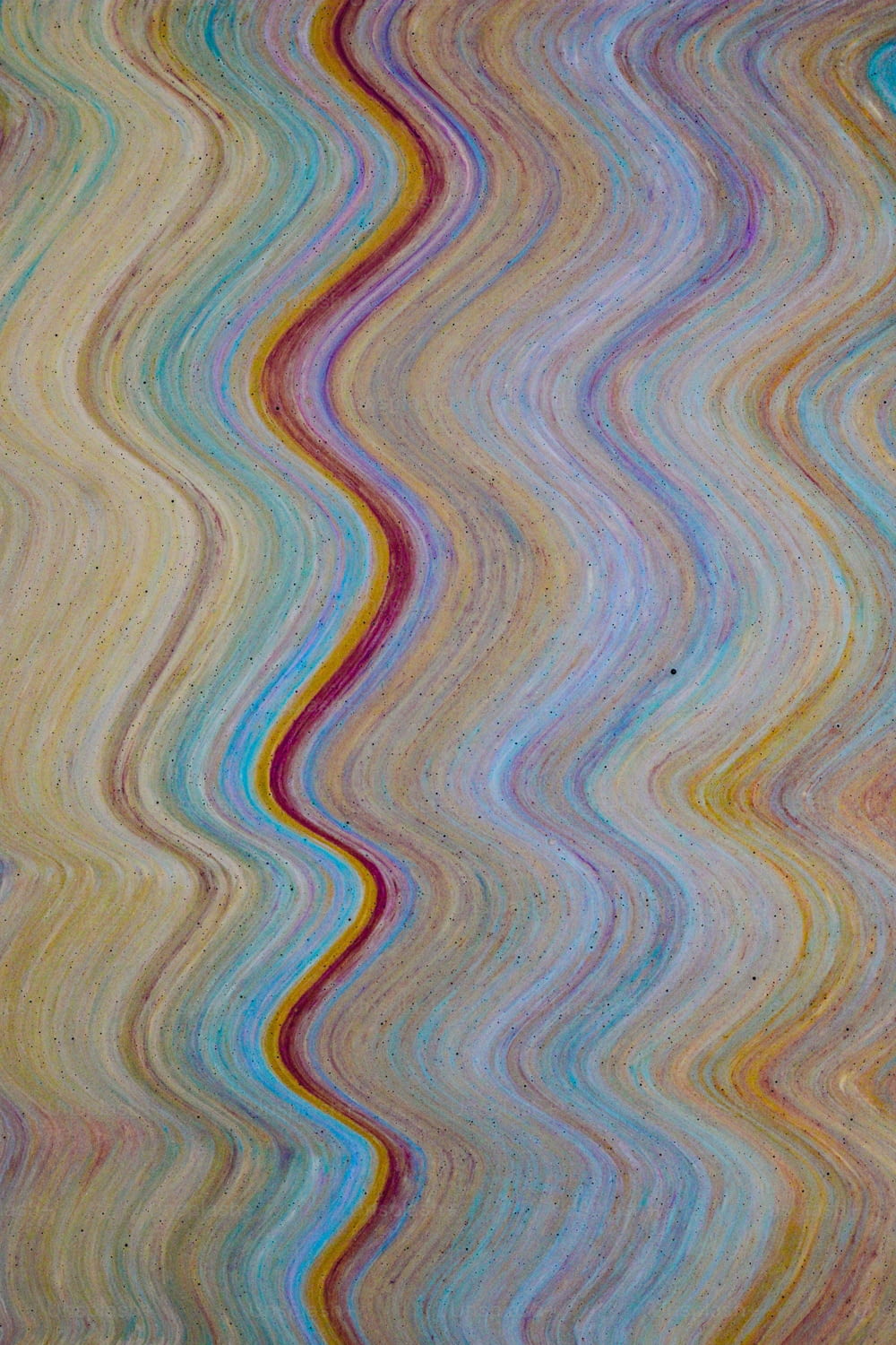 In diesem Bild ist ein mehrfarbiges Wellenmuster dargestellt