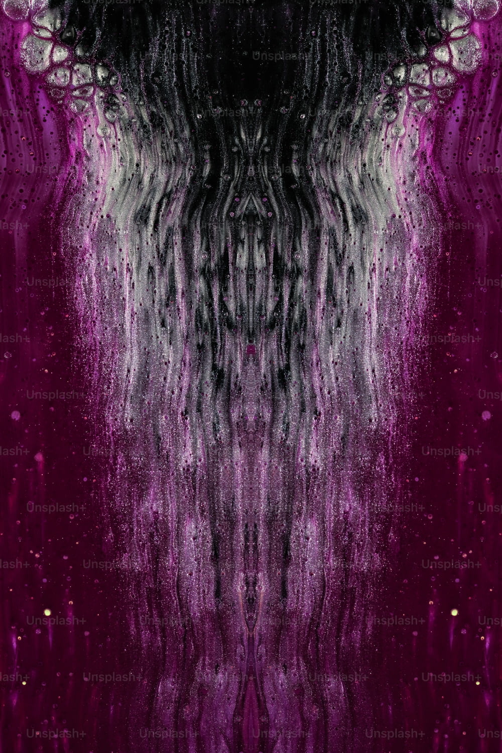 a purple and black background with a pattern