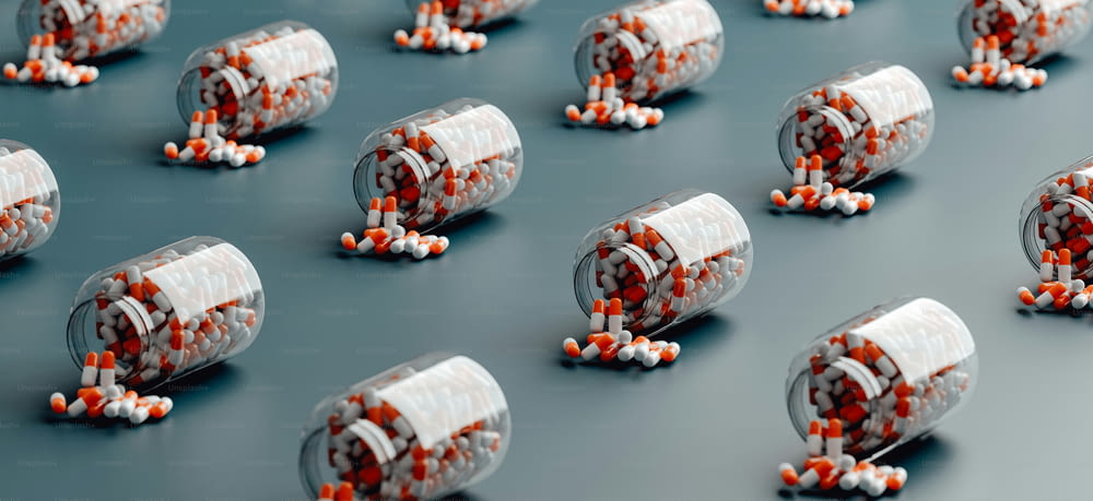 a group of pills spilling out of a bottle