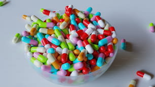 a bowl filled with lots of colorful candies