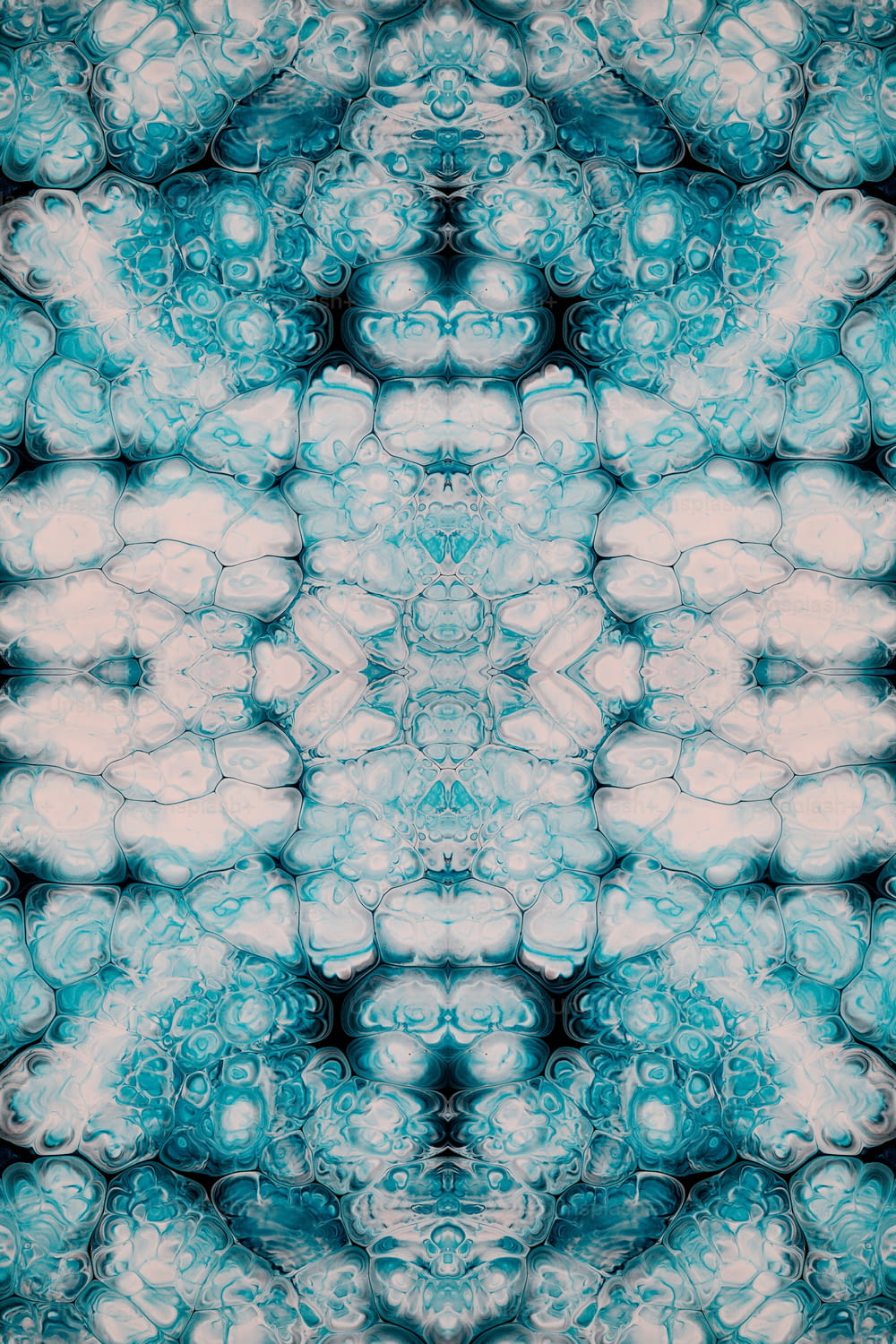 a blue and white pattern with a black background